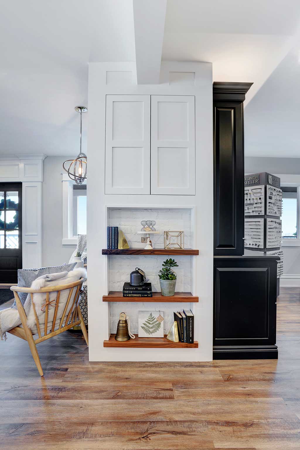 White cabinets set with modern decorations