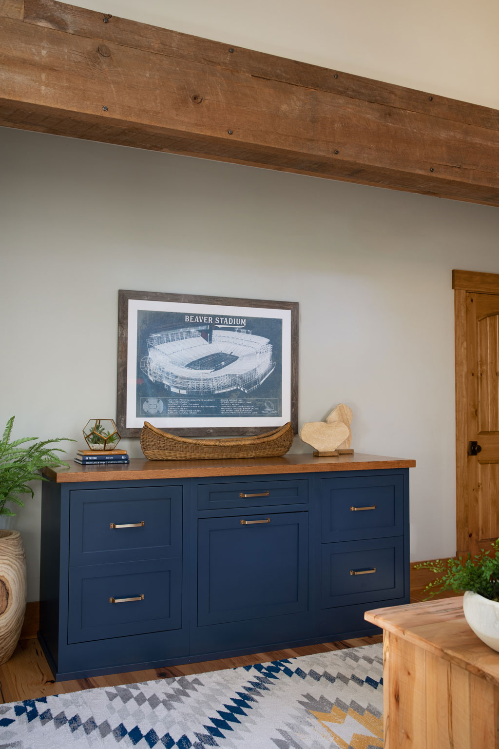 Blue dressor in a timber frame home
